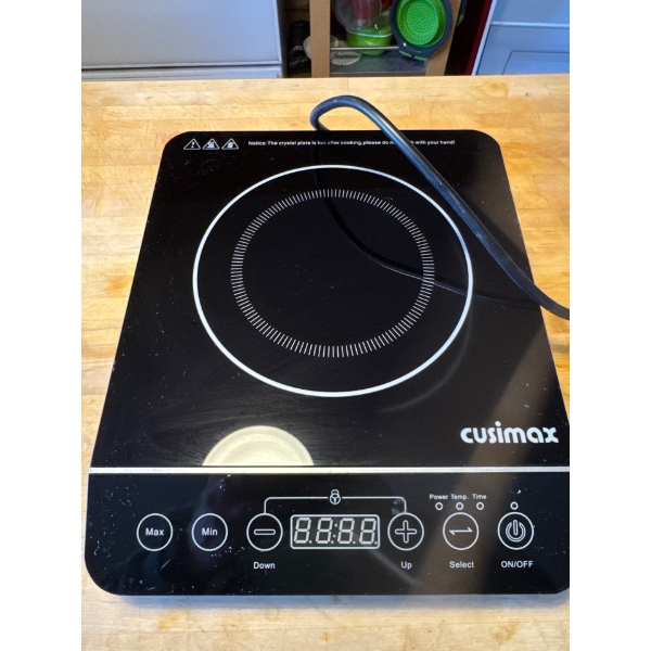 CUSIMAX Portable Induction Cooker. Uses electromagnetic coils to heat cookware directly, offering fa