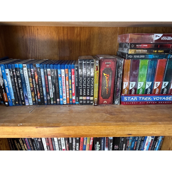 Indiana Jones, Star Trek, and other DVDs.