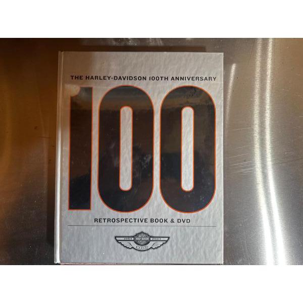 The Harley Davidson hundredth anniversary retrospective book and DVD still in plastic