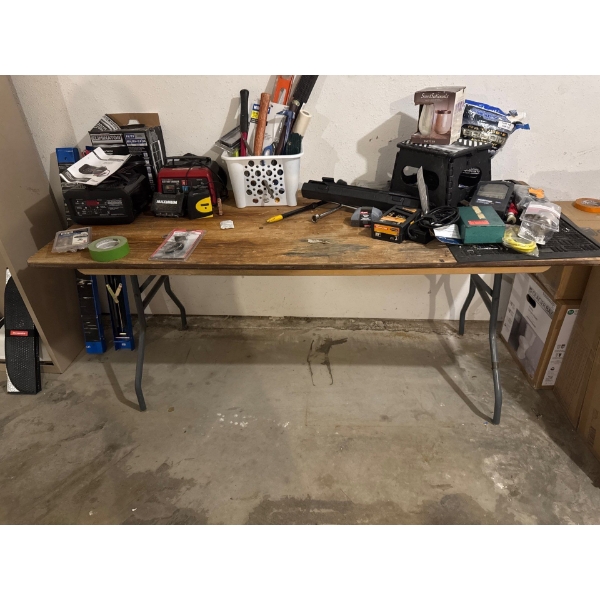 Six foot wooden folding table, contents not included