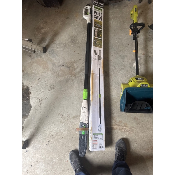 A Portland 6.5 Amp, 9.5 in Electric Pole Saw, features a telescoping fiberglass pole that extends fr
