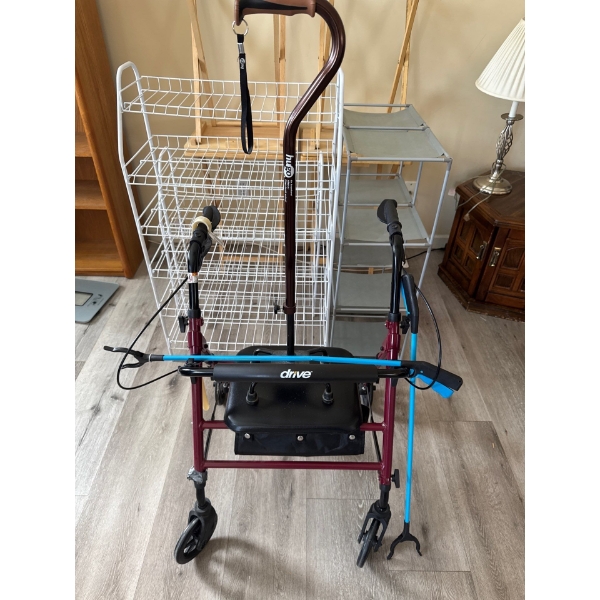 Burgundy and black walker, walking cane with 4 peg base, two grippers and a shoe horn