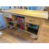 Image 2 :  kitchen island featuring a butcher block countertop, drawers, and open shelving. 