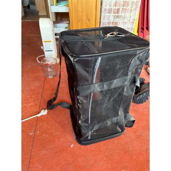 Cat carrier. 10 and a half by 19 and a half long by 10 and a half deep.