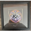 Image 2 :  framed artwork is a piece titled "Earth (The Wolf)" from the Elements Series created by Coast Salis