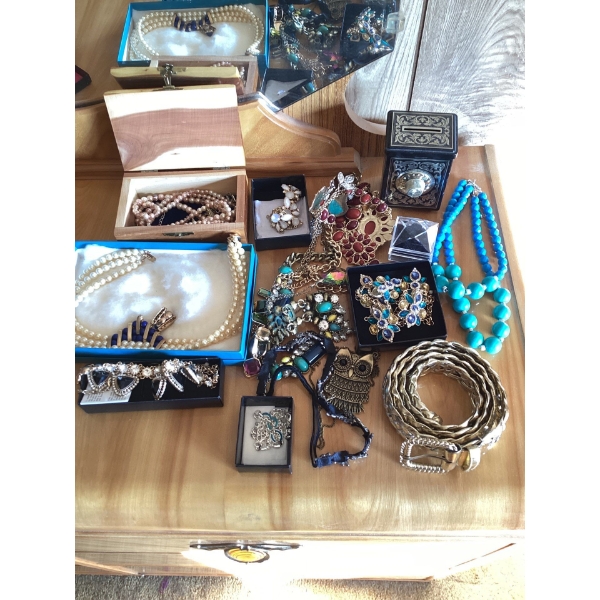 Vintage costume jewelry and accessories, The assortment includes various necklaces, bracelets, brooc