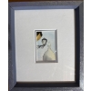 Image 1 :  displays a framed original watercolor painting featuring a street lamp and a dome structure. 