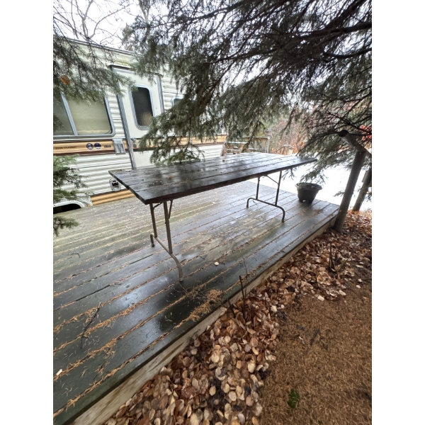 Six foot folding wood table.