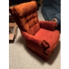 Image 1 : One blue fabric sofa with wood trim and one orange upholstered armchair with tufted back and wide ar