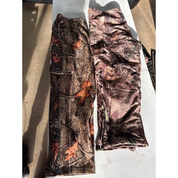 Two pairs of XL mossy oak and oak tree camo hunting pants, both like new.