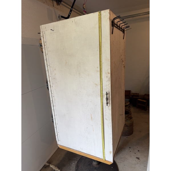 Wooden storage cabinet featuring five metal shelves mounted on the interior sides, with a metal hand