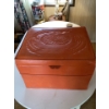 Image 1 : leather orange ottoman. Contents included. Unknown items.