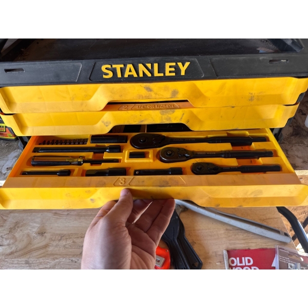 Stanley Professional Grade 3-Drawer Tool Chest, typically used for storing mechanics' tool sets. 
Br