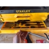 Image 1 : Stanley Professional Grade 3-Drawer Tool Chest, typically used for storing mechanics' tool sets. 
Br