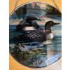 Image 1 :  collectible decorative glass suncatcher depicting a loon family scene. 