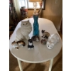 Image 2 :  collection of various ceramic cat figurines.The figurines include a large whi