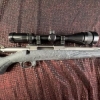Image 3 : Ruger American bolt action rifle chambered in .243 Win, matte grey speckled synthetic stock, fluted 