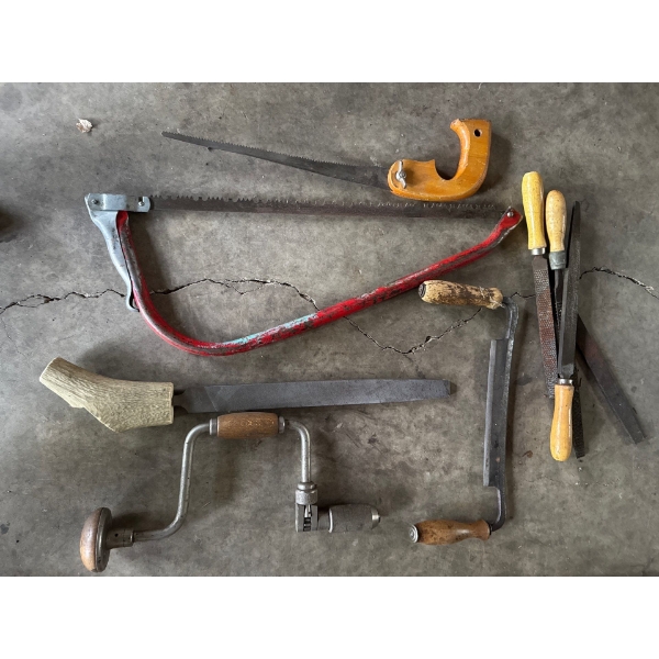 Collection of old hand tools, hand drill, rasp, file with antler handle, wood saws, very nice files.