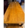 Image 4 :  vintage-style wooden coffee table features a rectangular top, sturdy turned legs, and built-in stor