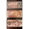 Image 1 :  vintage Canadian two-dollar banknotes featuring Queen Elizabeth II. 
Banknotes: The notes belong to