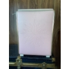 Image 4 : This is a vintage pink vinyl laundry hamper or clothes basket with a decorative starburst design. It