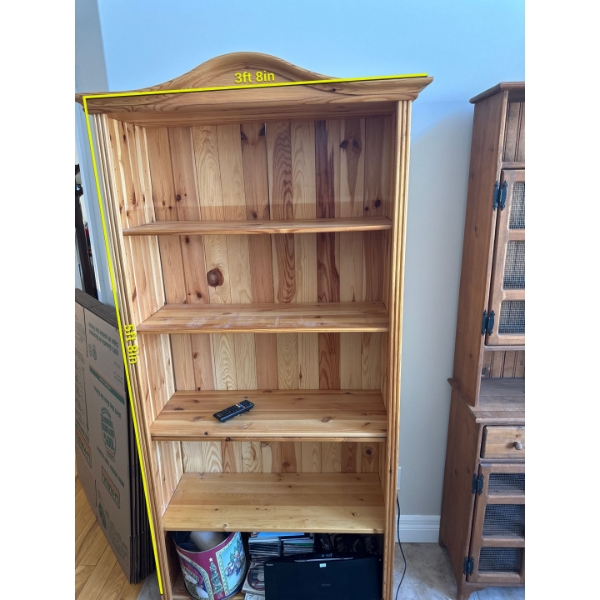 Tall, solid pine open bookcase featuring four shelves and a curved top accent.