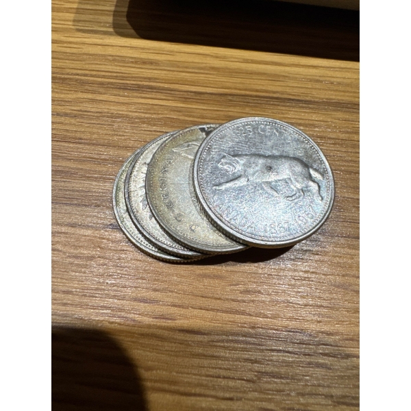 4 SILVER QUARTERS