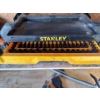 Image 3 : Stanley Professional Grade 3-Drawer Tool Chest, typically used for storing mechanics' tool sets. 
Br