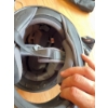 Image 9 : HJC full-face black motorcycle helmet with visor, a pair of Teknic armored gloves, and black leather