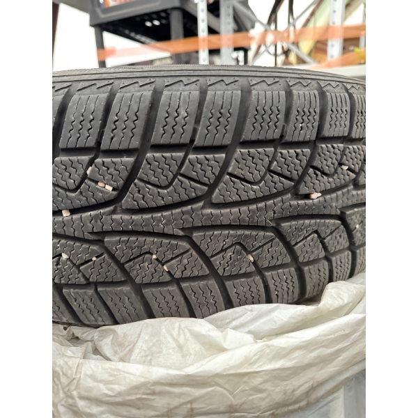   SET OF 195/  65 /R15 winter tires with rims.