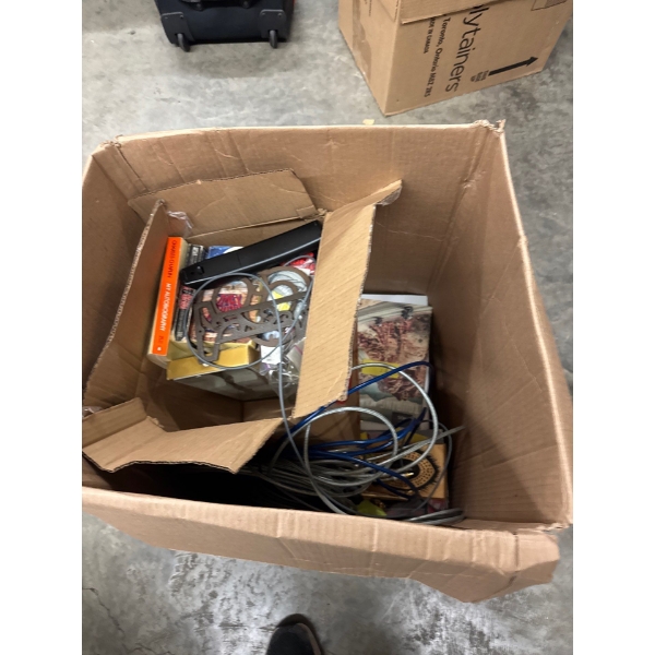 Box of miscellaneous books, board games, and and more.