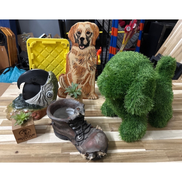 Sally’s place centre and doggy daycare’s decor, ornamental, dog, ceramic parrot, fuzzy, fake grass, 