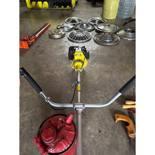 Vintage fuel can and whippersnipper John Deere 350 G