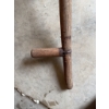 Image 4 : Traditional scythe with a wooden handle and metal blade, along with a metal adjustable hay rake atta