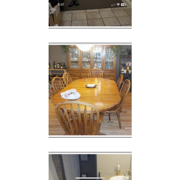 Six oak chairs with a dining set, oval dining set with extension.