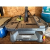 Image 1 : The item in the image is a Rockwell BladeRunner X2 Portable Tabletop Saw, model RK7323. 


Versatile
