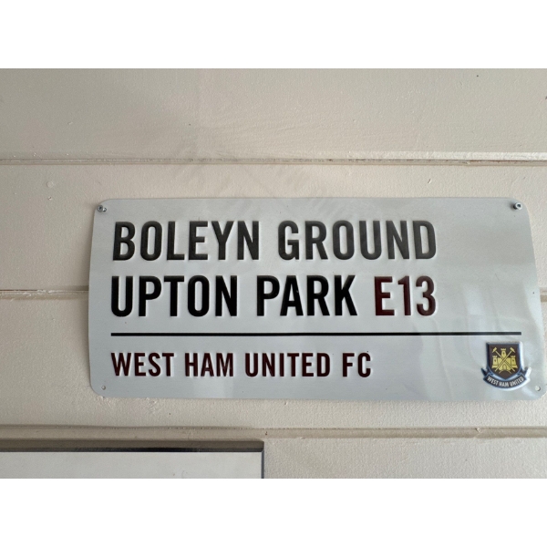 A metal sign commemorating the Boleyn Ground, the historic stadium of West Ham United FC. The sign a
