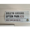 Image 1 : A metal sign commemorating the Boleyn Ground, the historic stadium of West Ham United FC. The sign a