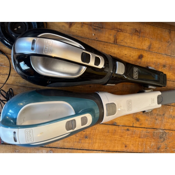 Two Black+Decker handheld vacuums, commonly known as Dustbusters. The top model is likely a 20V Lith