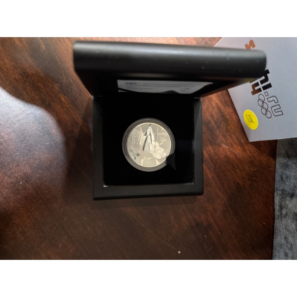  2014 Sochi Winter Olympics 3-Roubles sterling silver coin. 
It features a proof finish and selectiv