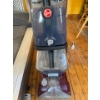 Image 1 : Hoover Power Scrub Deluxe Carpet Cleaner, which is designed to deeply clean carpets and upholstery. 