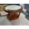 Image 1 : An oval mahogany coffee table with a green marble inset top