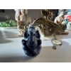 Image 7 : collection of various figurines, including a prominent brass or bronze dragon, a clear quartz or gla