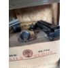 Image 2 : All four racks and their contents, featuring an air nailer, miscellaneous items, nails, and more. Ev