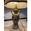 Image 12 : Porcelain table lamp featuring two handles, gold accents, and a classical painted pastoral scene. La
