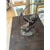 Image 2 : bronze sculpture titled "Starshooter," created by artist Lincoln Fox and often produced by the Fran