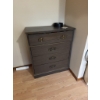Image 6 : This vintage-style wooden dresser features ornate carved drawer fronts, brass-colored handles, and a