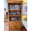 Image 1 :  rustic-style wooden bookcase with lower storage cabinets. 
Features three upper open shelves for di
