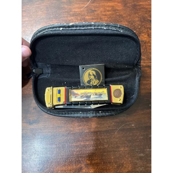  Franklin Mint MK II River Patrol Boat collector's pocketknife. 
It features a stainless steel blade
