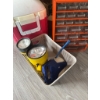 Image 7 : Orange plastic drawer organizer, a red and white cooler, two yellow handheld flashlights, a handheld